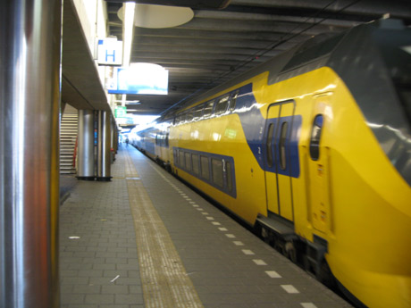 Leaving dutch train in utrecht central station photo